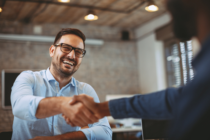 Two people shaking hands